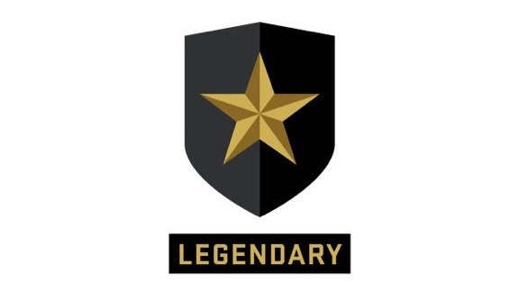A black and gold star on top of a shield.